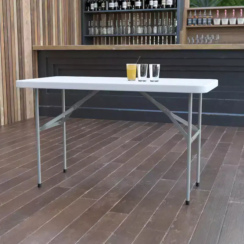 Table pliante rectangulaire blanche, 4 places assises